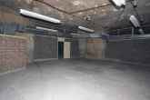 One of the bunker's larger offices spaces. In the stores were hundreds of fold up tables ready to populate them.