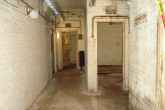 Looking along a main corridor towards the telephone switch room.