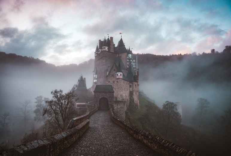 Closeup photo of castle with mist